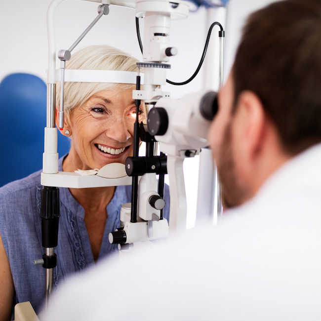 Photo of an older lady in an eye exam