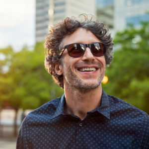 Man standing outside wearing sunglasses