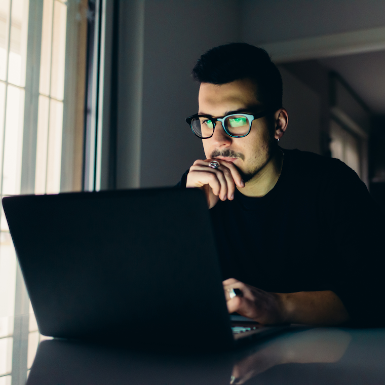 Man staring at computer screen