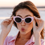 Woman wearing sunglasses outside.